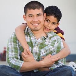 Father and son hugging